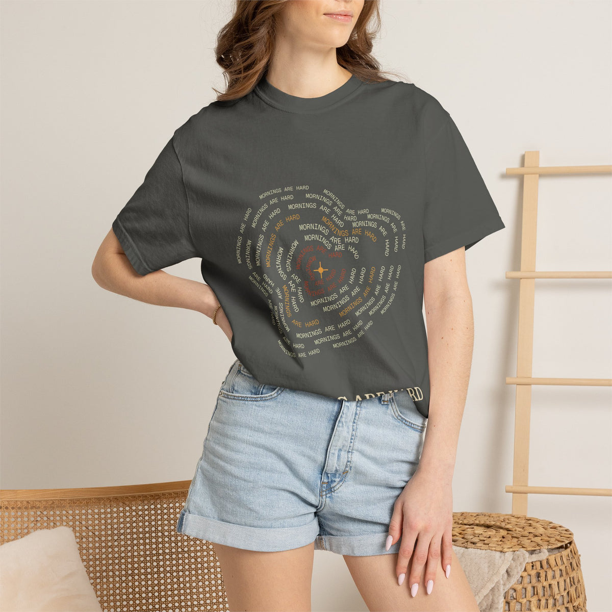 Lifestyle shot of the Mornings Are Hard topographic map coffee tee